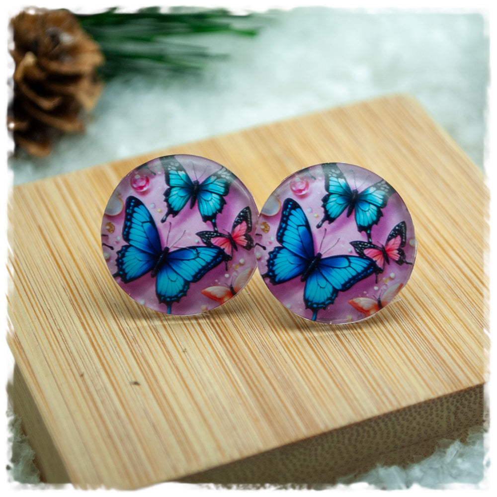 Ohrringe in 20 mm rosa mit blauen Schmetterlingen