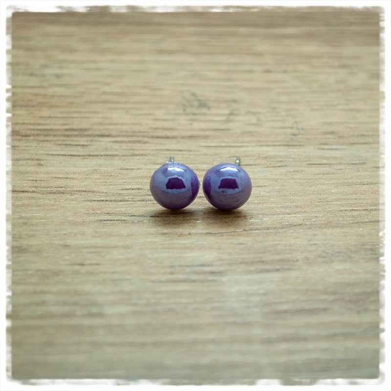 Ohrringe in 8 mm Stein lila