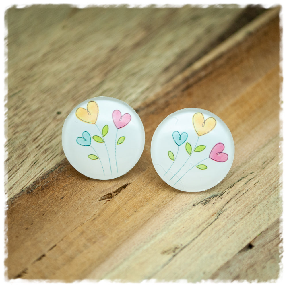 Ohrringe in 20 mm weiß mit Herzblumen