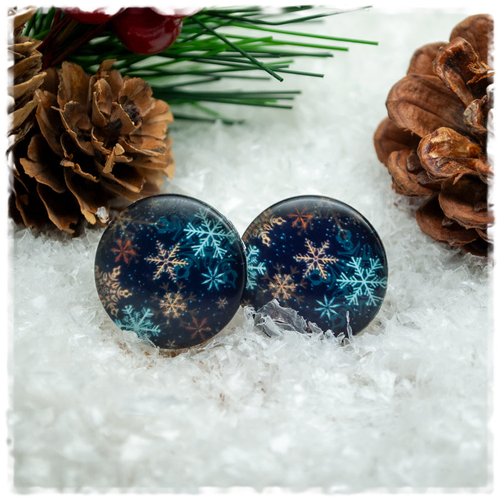 Ohrringe dunkelblau mit hellblauen und rosegoldenen Schneeflocken