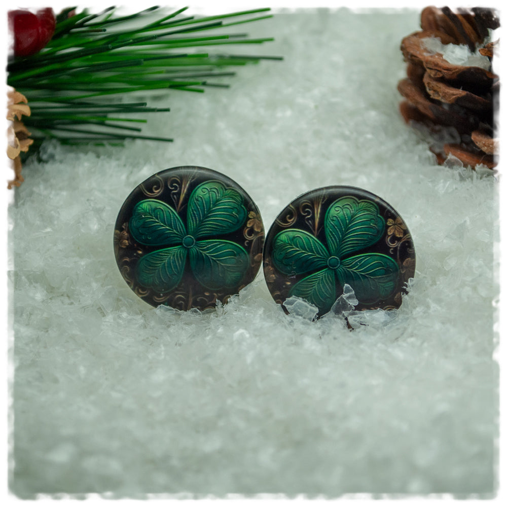 Ohrringe schwarz mit goldenen Ornamenten und Kleeblatt