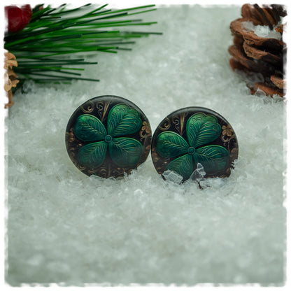 Ohrringe schwarz mit goldenen Ornamenten und Kleeblatt