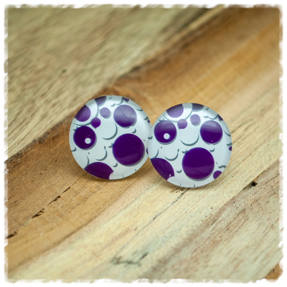 Ohrringe mit violetten und weißen Kreisen