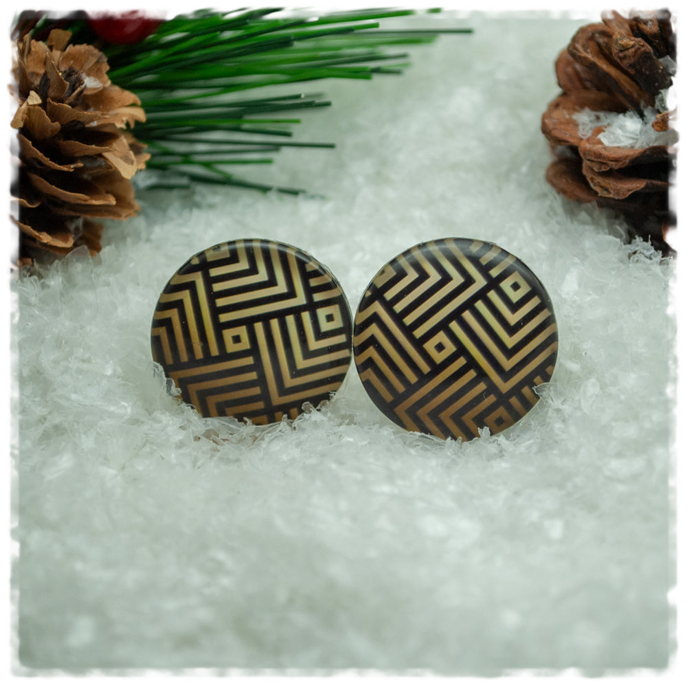 Ohrringe mit Strichen in schwarz und golden