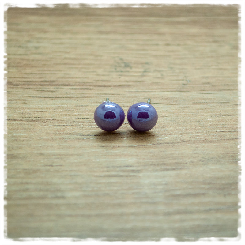 Ohrringe in 8 mm Stein lila